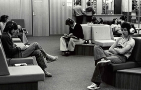 Students using audiovisual resources on level six, 1970s.
