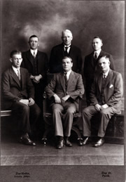 John Curtin Prime Ministerial Library.  Records of William Edgar Stannard.  Framed photograph of John Curtin with William Edgar Stannard and other members of the Metropolitan Whole Milk Board, 27 June 1934.  JCPML00978/1