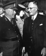 General Blamey greeting John Curtin in Brisbane on his return from overseas, 1944. JCPML00409/17