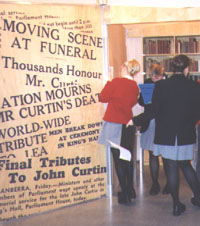 Students viewing the exhibition "Man of Peace"
