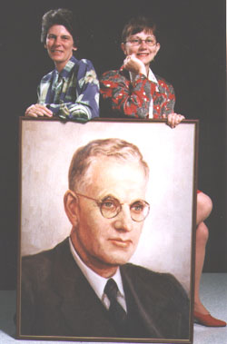 Kandy-Jane Henderson and Vicki Williamson with portrait of John Curtin
