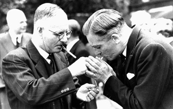 John Curtin lighting a cigarette for Anthony Eden, 1944.