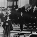 Rev. Hector Harrison leading pall bearers and casket containing the body of Prime Minister John Curtin after the official service in King's Hall Canberra, July, 1945. JCPML00376/170