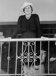 Mrs Curtin speaking from balcony at the Lodge at opening of garden fete in aid of Canberra Hospital Auxilliary Fund, 29 November 1941. JCPML00376/31