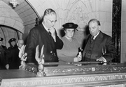 John Curtin Prime Ministerial Library.  Records of the Curtin Family.  Australian Prime Minister John Curtin & Mrs Curtin With Canadian Prime Minister Mackenzie King examining Book of Remembrance in Memorial Chamber, Peace Tower, in Parliament Buildings.1944.  JCPML00376/104