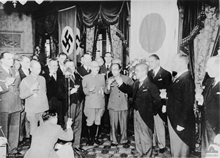 Tokyo, Japan. 1940-09. General Hideki Tojo (centre) proposes a toast with the German Ambassador to