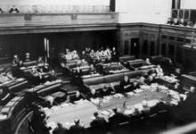 External Affairs Minister Evatt addresses the House while PM (next left) thoughtfully listens [n.d.]. JCPML00376/91. 