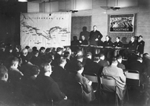 Robert Menzies speaking to the press at the Ministry of Information, London, 1941. JCPML00916/6. 