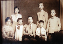 Tatsuo Kawai with his wife Tomiko and their children, Setsuko and Kiyoshi (front row) and Keiko, Taro and Masumi (back row), n.d. JCPML01224/10. 