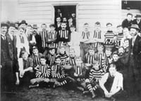 Brunswick Football Club, 1905, John Curtin is to the left of the doorway wearing a cloth cap