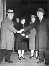Prime Minister John Curtin & Mrs Curtin being met at Washington by Mr Cordell Hull & Mrs Hull (Secretary of State, USA) 23.4.1944. Records of the Curtin Family. JCPML00376/107.