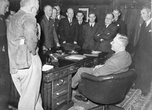 Former journalist John Curtin meets the Canberra Press Gallery. (Known as The Circus) C.1945. Records of the Curtin Family. JCPML00376/2.