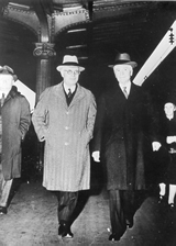 P.M. John Curtin with U.S.A. Secretary of State, Cordell Hull. Mrs Curtin in R.H. background, Washington, D.C. 1944. Records of the Curtin Family. JCPML00376/98.