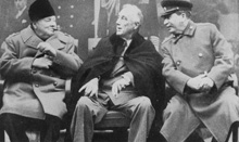 Yalta, Black Sea, USSR. 1945-02. British Prime Minister Winston Churchill, in a Caucasian black fur hat, with US President Franklin Roosevelt (showing evident signs of failing health) and Soviet Marshal Josef Stalin at the Yalta Allied Conference. Australian War Memorial, ID P02018.353 