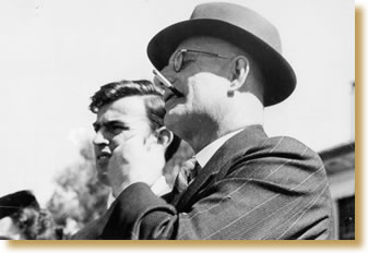 John Curtin watching football in the war years