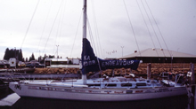 The Parry Endeavour docked in Fremantle prior to departure on the triple circumnavigation. Challenger [Endeavour]: mast removal, ca 1986. CUL00039/9/1.